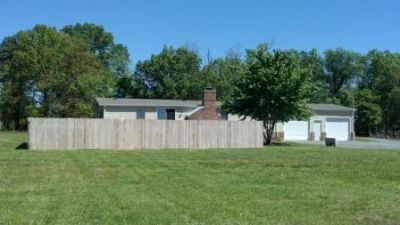 WorWork for Equity on this Affordable Home with Lots of Land & Potential!